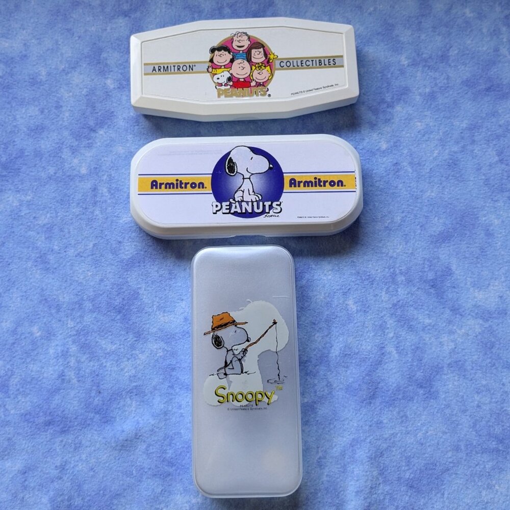 Snoopy/Peanuts plastic watch boxes